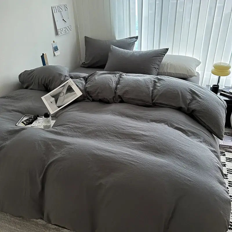 Decorbites luxurious cotton bedding set in cozy textured gray with soft fabric and matching pillows neatly arranged on bed
