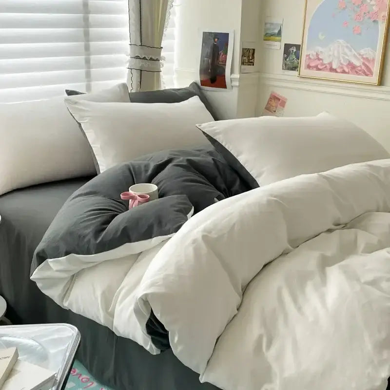 A cozy decorbites™ luxurious cotton bedding set with white and dark gray plush duvet cover and matching pcs bed sheet
