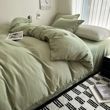 Soft sage green cotton bedding set featuring a luxurious linen duvet cover with matching pillows by DecorBites