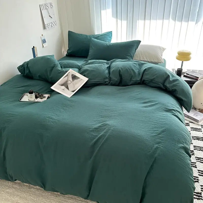 Teal-colored decorbites™ luxurious cotton bedding set with soft textured quilted duvet and matching pillows