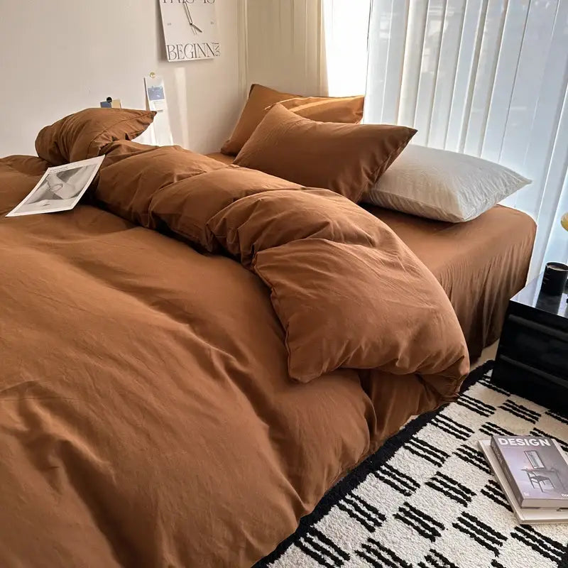 Warm brown DecorBites™ cotton bedding set with soft slightly wrinkled fabric and matching duvet cover and pillows