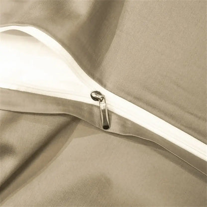 Beige satin pillowcase with white zipper and metallic pull tab from decorbites™ luxurious egyptian cotton bedding set
