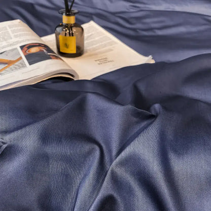 Deep navy satin duvet cover with subtle woven texture in DecorBites luxurious Egyptian cotton bedding set