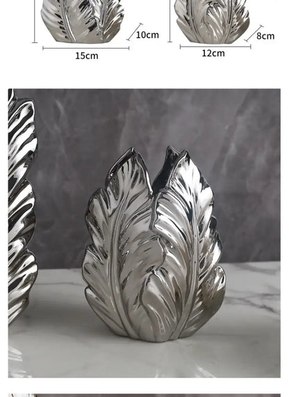 Silver leaf-shaped luxurious gold ceramic vase with glossy metallic finish and detailed veining for home decor