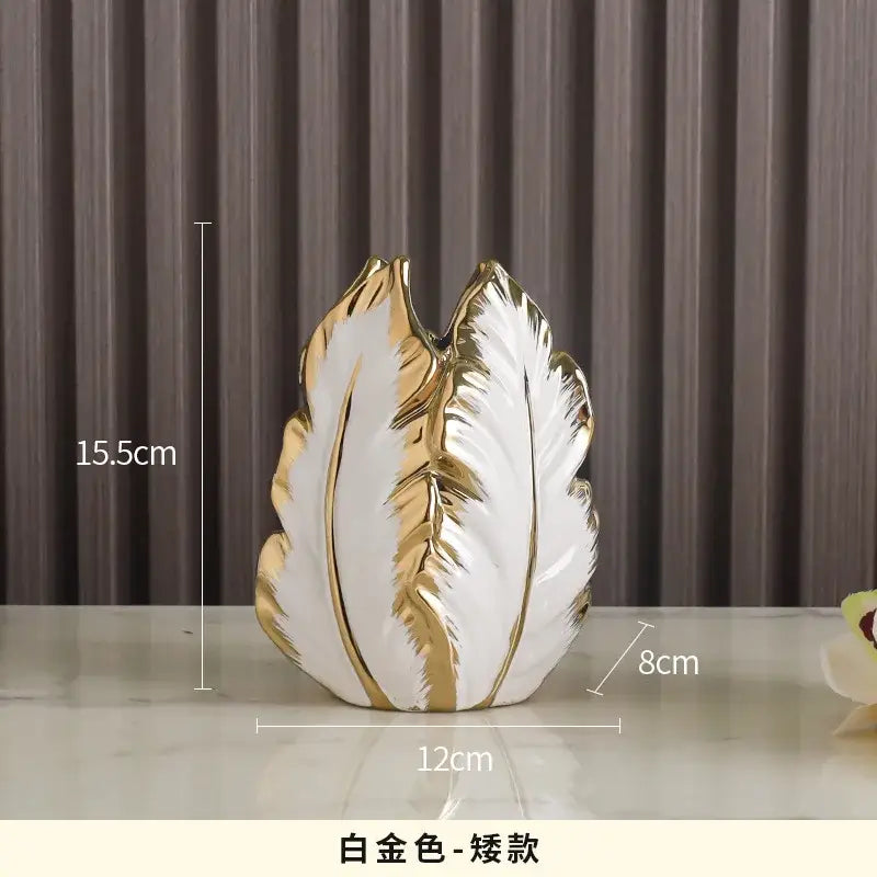 DecorBites™ luxurious gold ceramic vases feature a sleek white and gold leaf design for elegant home decor