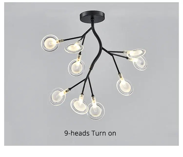 DecorBites™ luxurious golden led chandelier with black metal frame and nine clear glass bulbs branching like tree limbs