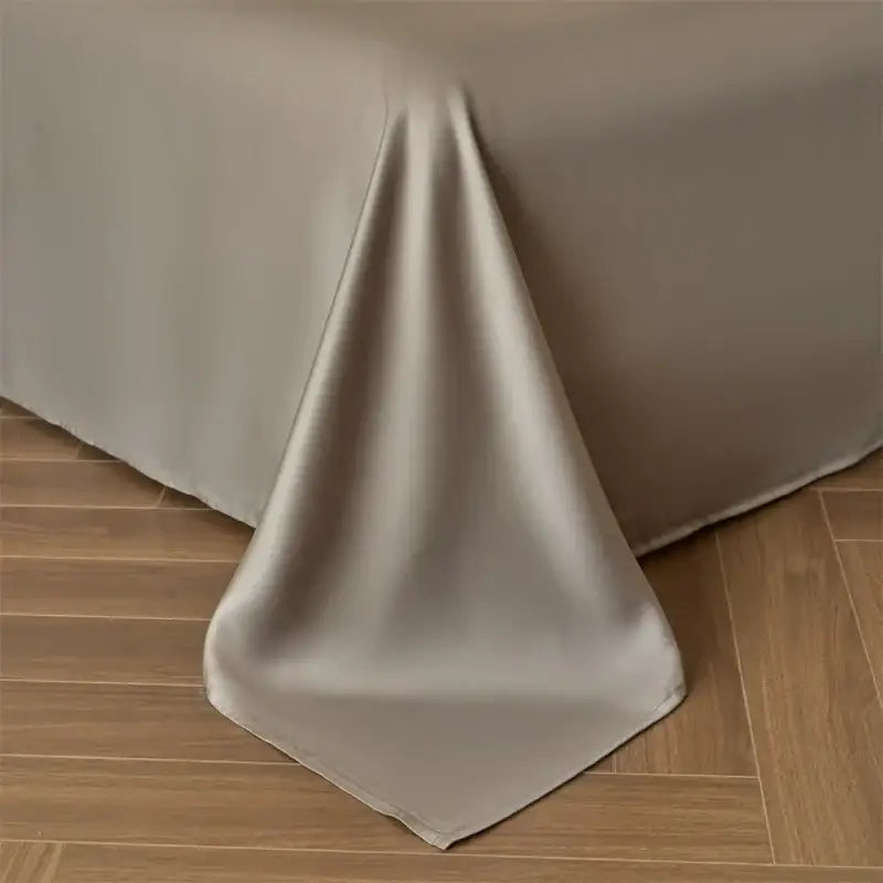 Beige satin duvet cover with smooth flowing drape from decorbites™ luxurious lyocell silk bedding set queen king size