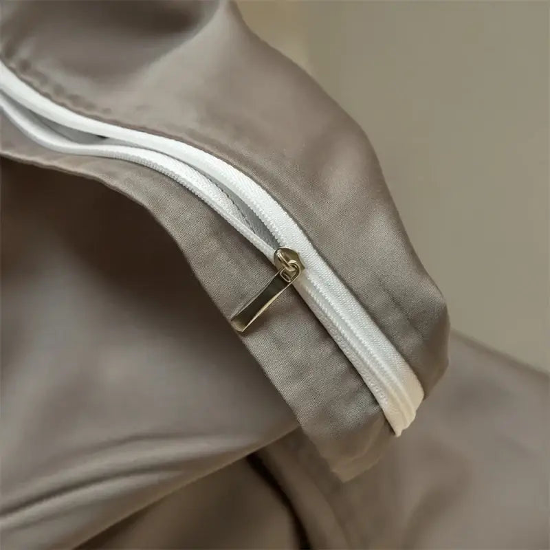 Decorbites™ luxurious lyocell silk pillowcase in taupe satin with white zipper and gold pull for duvet cover set