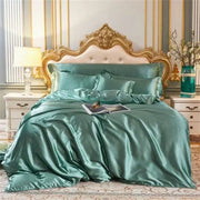Decorbites™ luxurious mulberry silk teal satin bedding set with duvet cover and pillowcases on gold-framed bed