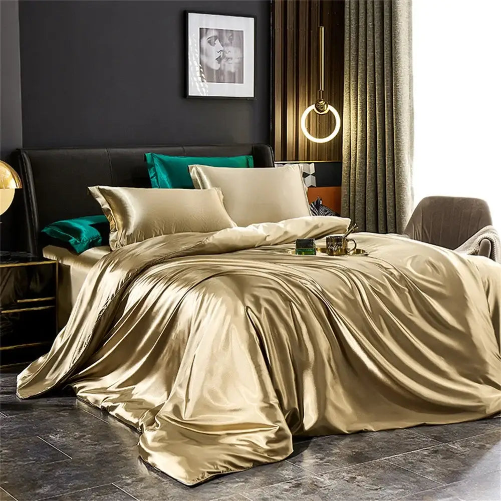 Decorbites™ luxurious silk duvet cover bedding set in gold satin with teal accent pillow elegantly draped on bed
