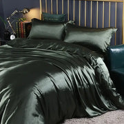 Deep emerald satin duvet cover set with matching pillowcases featuring luxurious sheen in decorbites pcs duvet cover collection