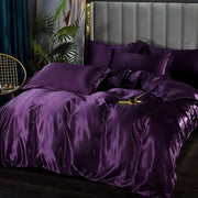 Decorbites™ luxurious silk duvet cover set in lustrous deep purple satin with matching pcs duvet cover and tufted headboard