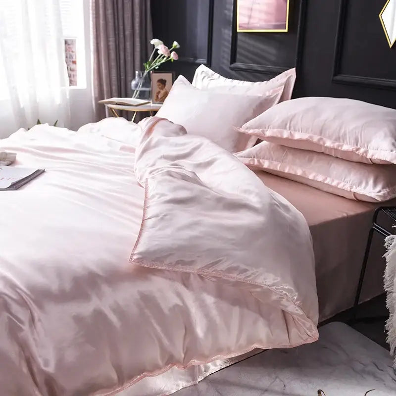 Decorbites™ luxurious silk bedding set with a soft blush-pink satin duvet cover and matching pillowcases