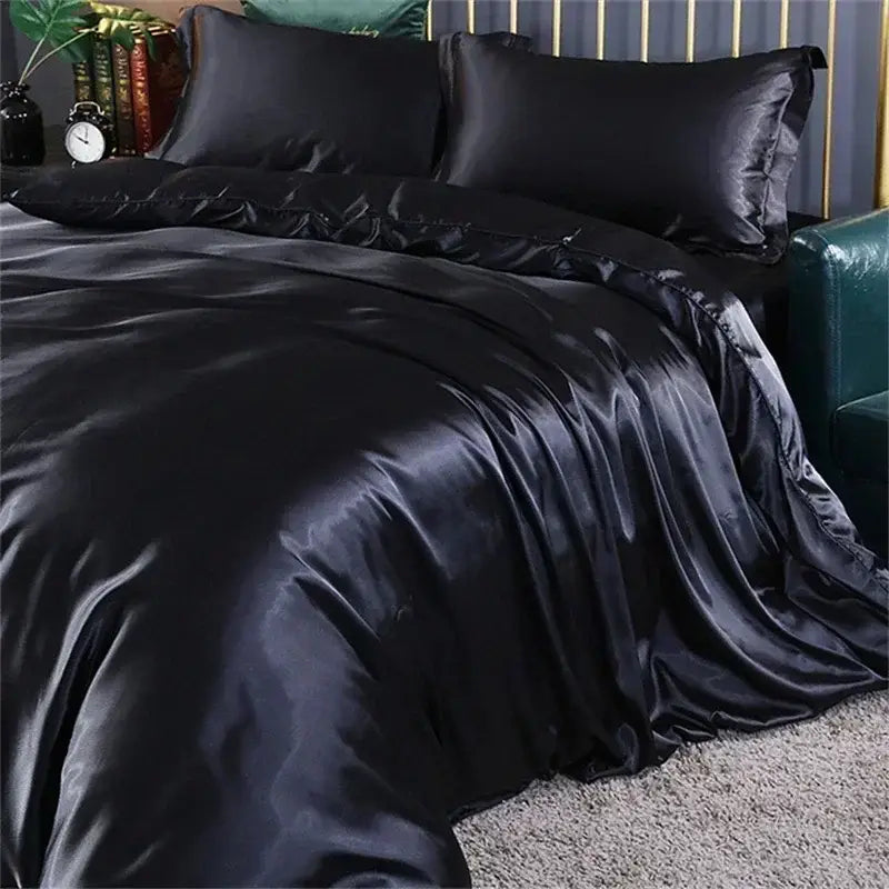 Decorbites™ luxurious silk bedding set in black with satin duvet cover and matching pillowcases featuring elegant ruffles