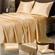 Cream-colored decorbites™ luxurious solid color satin bedding set with pillowcases and fitted sheet for elegant comfort