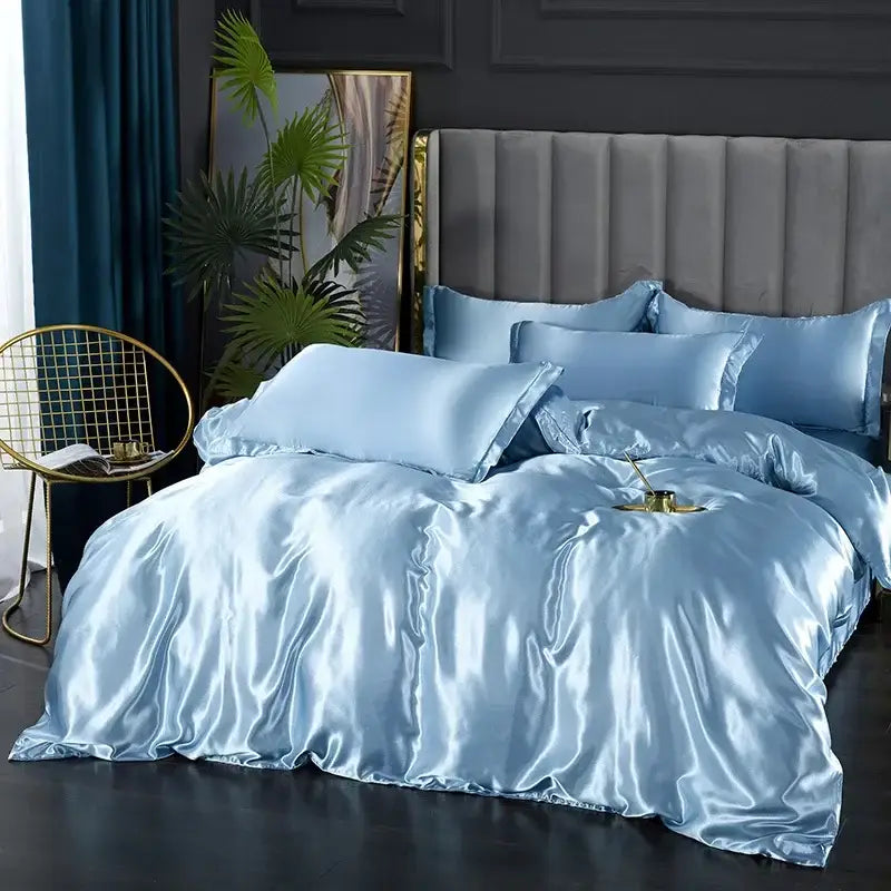 Light blue satin duvet cover set with glossy finish and matching pillows from DecorBites™ luxurious pcs duvet cover collection