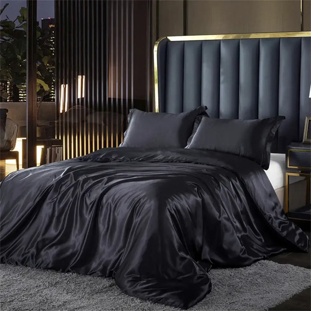 Black satin duvet cover set with matching pillows featuring luxurious sheen in DecorBites pcs duvet cover collection