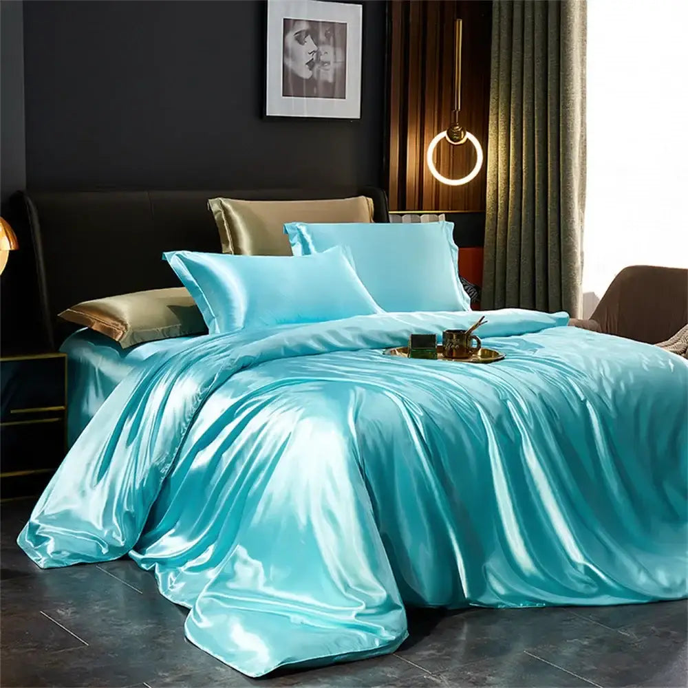 Turquoise satin silk duvet cover set by decorbites with matching pillows and gold-trimmed accent pillow pcs duvet cover