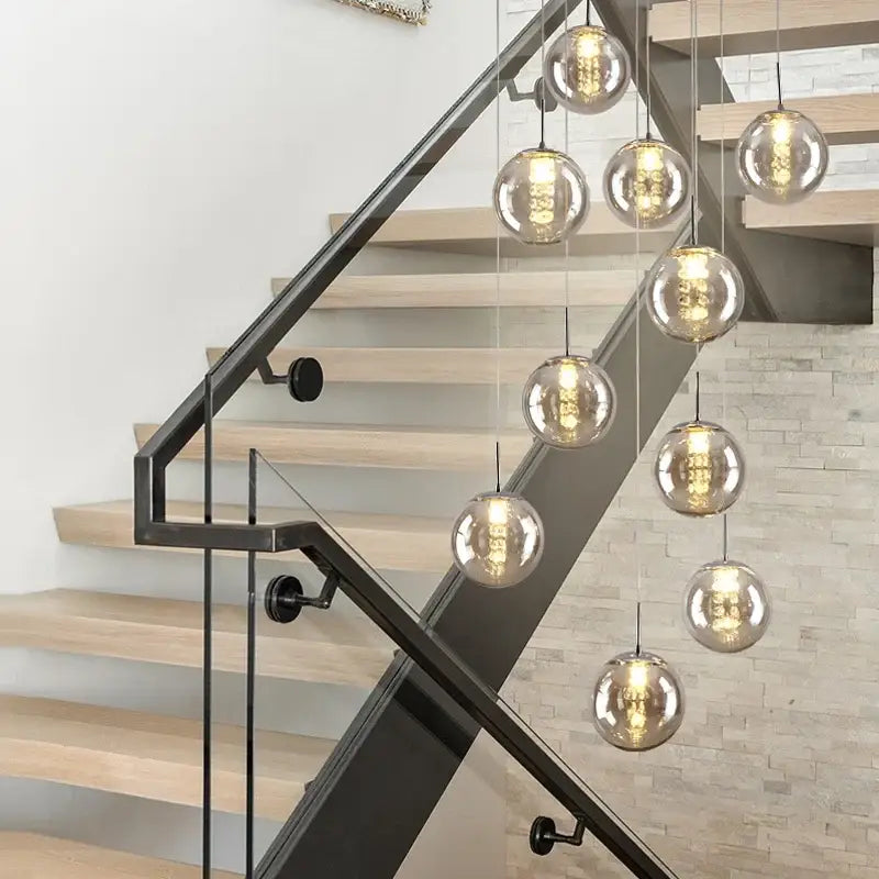 Modern loft chandelier DecorBites™ luxurious spiral LED glass pendant lights with warm glowing bulbs in cascading design