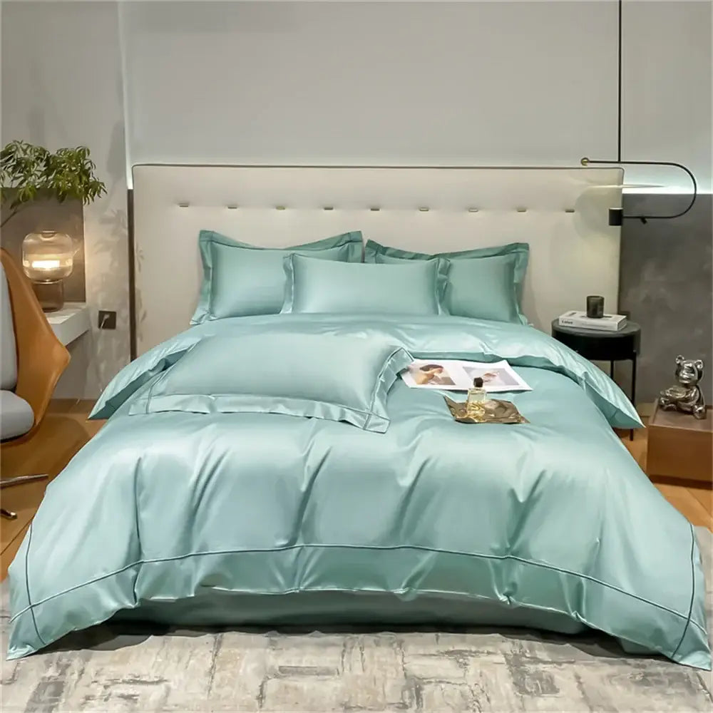 A luxurious mint green satin egyptian cotton bedding set with matching pillow sham and decorative piping from decorbites