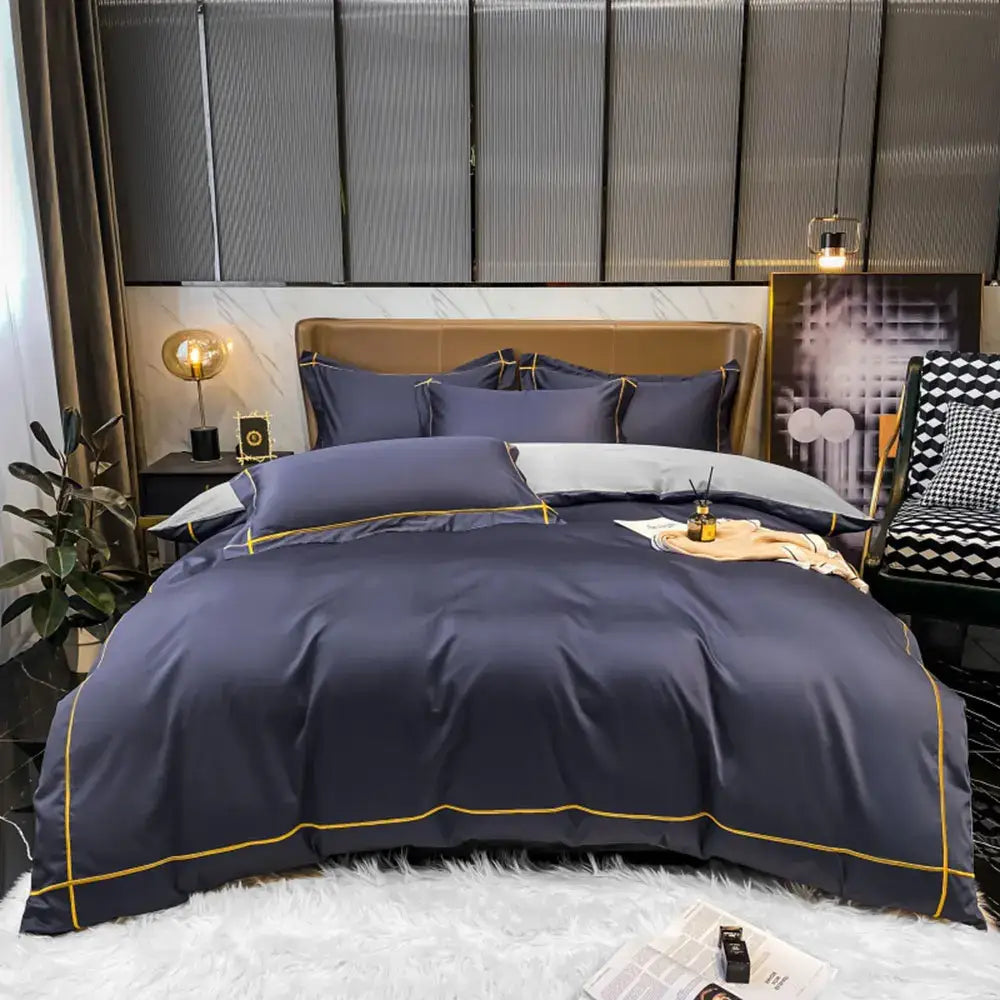 Navy blue satin egyptian cotton bedding set with gold piping accents in the decorbites luxurious duvet cover collection