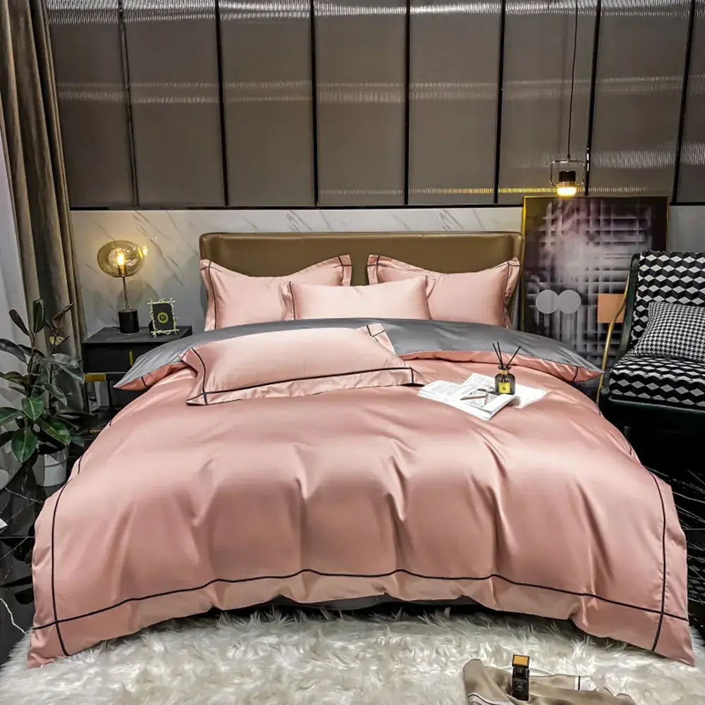 Pink satin duvet cover bedding set with black piping detail made from luxurious egyptian cotton by decorbites