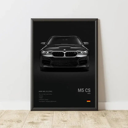 Black framed wall art print of a matte black bmw m5 cs 2021 with kidney grille for modern home decor
