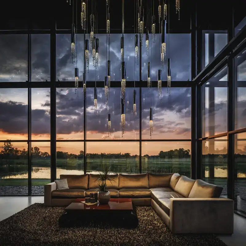 Beige leather sectional sofa with modern l-shaped design and plush cushions near chrome crystal led chandelier