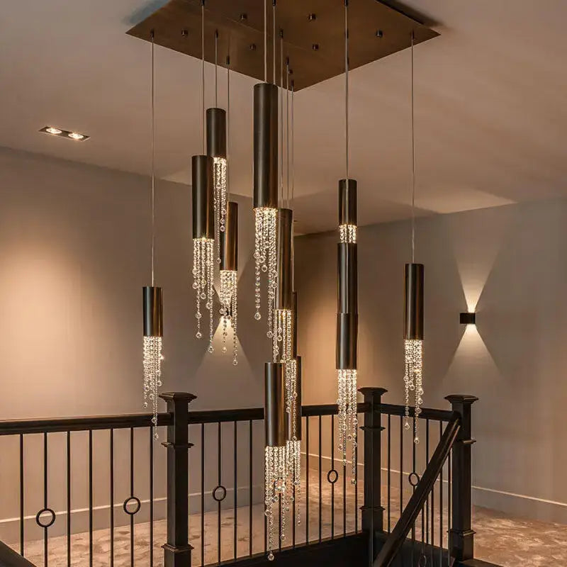 Modern bronze cylindrical chrome crystal led chandelier with cascading crystal droplets for staircase lighting