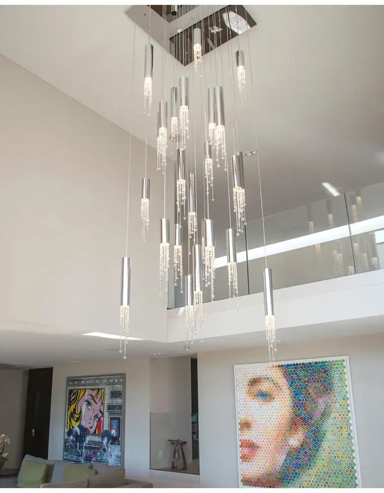 Modern decorbites luxury chrome crystal led chandelier with cascading droplets and cylindrical light fixtures for staircase