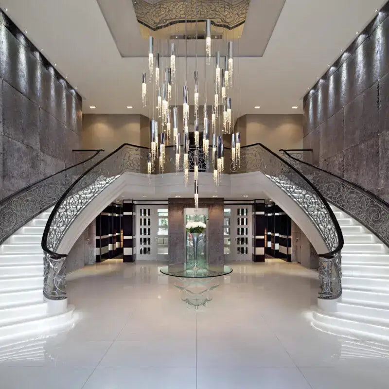 Decorbites™ luxury chrome crystal led chandelier with cascading cylindrical glass and metallic elements for staircase