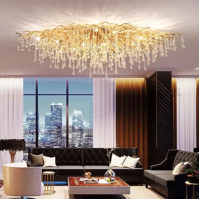 Golden branch-shaped luxury crystal chandelier with dangling crystal droplets for elegant home decor by DecorBites™