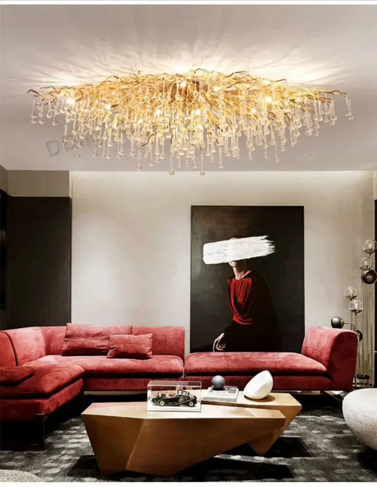 Golden glass luxury crystal chandelier with cascading crystal droplets for elegant home decor by DecorBites™