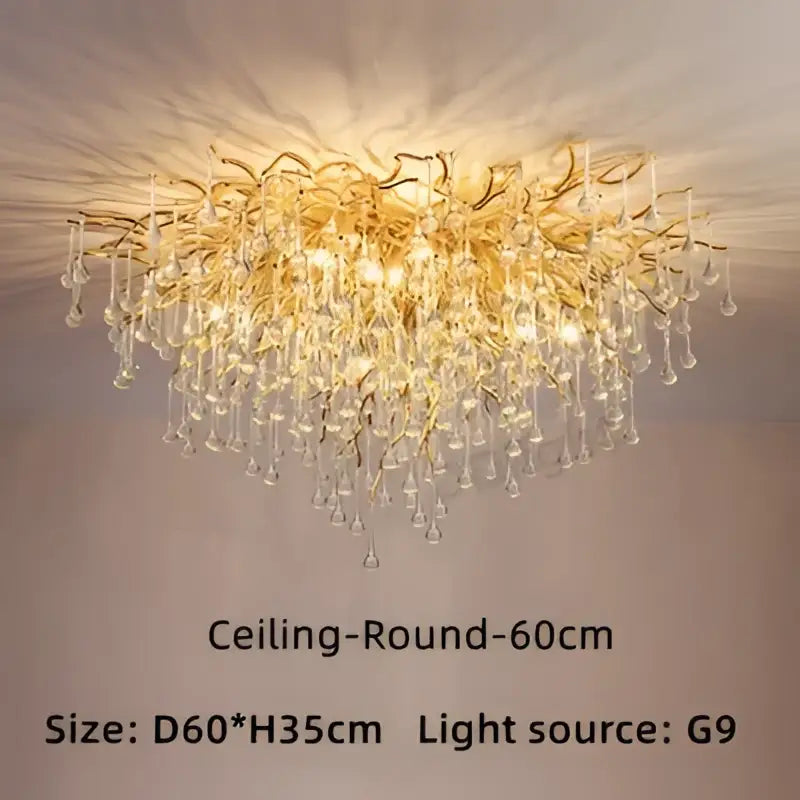 DecorBites luxury crystal chandelier featuring golden cascading teardrop pendants and intricate branching arms