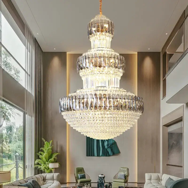 Decorbites luxury crystal multi-tiered chandelier with gold central stem and cascading clear faceted crystals for dining room