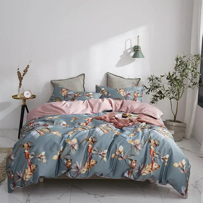 Blue floral duvet cover with pink satin-like inner lining and matching pieces pillowcases in egyptian cotton by DecorBites