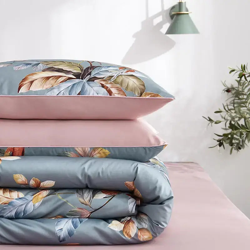 DecorBites luxury Egyptian cotton bedding set with soft blue duvet cover and pink pieces pillowcases featuring flamingo leaf pattern