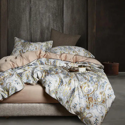 Luxurious cream-colored duvet cover with gold and blue paisley patterns and satin lining from DecorBites egyptian cotton set