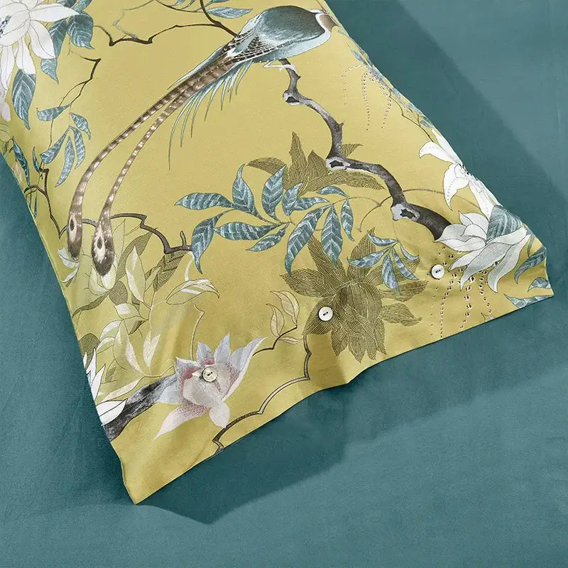 Yellow pillowcase with elegant bird and floral pattern in muted blues on egyptian cotton from decorbites duvet cover set