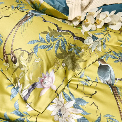Vibrant yellow satin duvet cover with intricate bird and foliage design in egyptian cotton from DecorBites luxury set