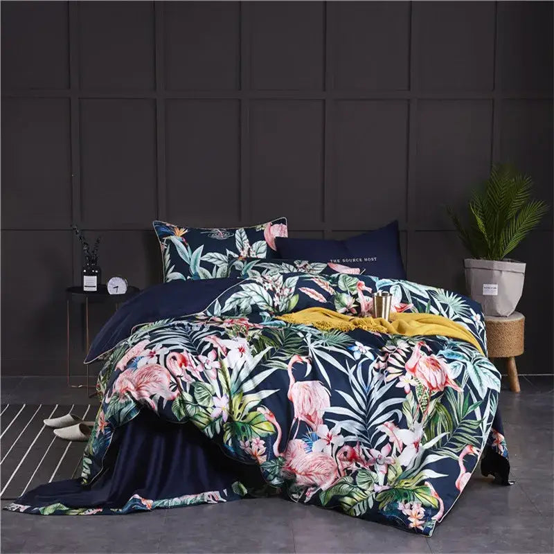 Navy blue egyptian cotton duvet cover and pillowcases set featuring vibrant pink flamingos and lush green foliage