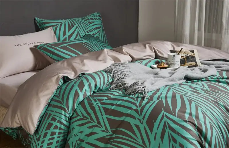 Teal and gray tropical leaf patterned duvet cover set with matching pieces pillowcases in egyptian cotton by decorbites