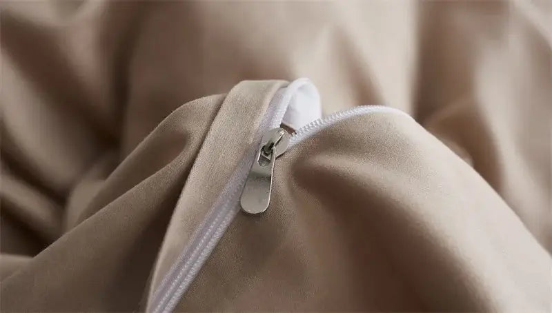 Beige egyptian cotton duvet cover with white zipper and silver-toned metal pull from decorbites luxury bedding set