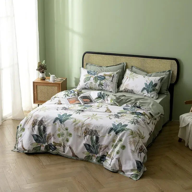 White duvet cover with jungle animal and foliage print in green gray and black made from egyptian cotton by DecorBites luxury set