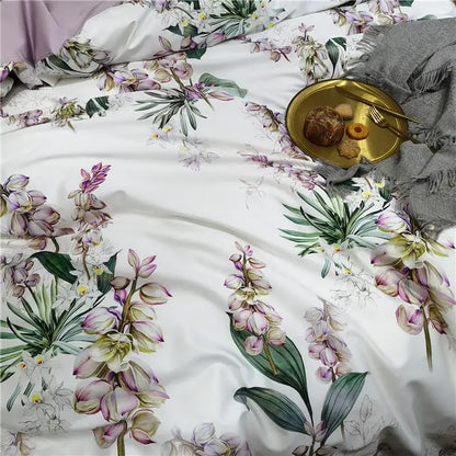White duvet cover with purple and green orchid print on soft satin egyptian cotton from DecorBites luxury bedding set
