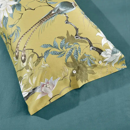 Yellow pillowcase with elegant bird and floral pattern in muted blues and greens from DecorBites™ egyptian cotton duvet cover set