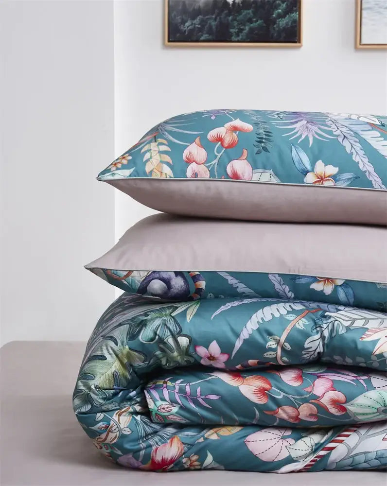 Decorbites luxury egyptian cotton duvet cover and pillowcases with teal floral pattern and subtle stitching details
