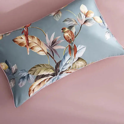 DecorBites luxury egyptian cotton pillowcase with soft blue satin finish and vibrant parrot botanical print
