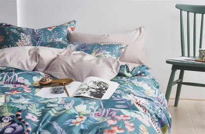 Decorbites luxury egyptian cotton duvet cover and pillowcases in teal satin with vibrant tropical floral and monkey print