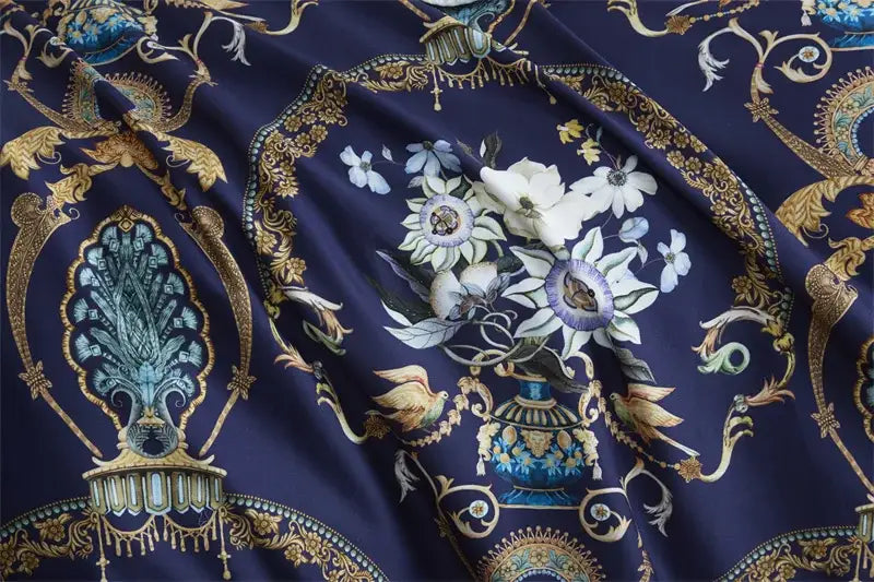 Deep navy silk duvet cover with gold and teal baroque motifs in DecorBites luxury egyptian cotton pillowcases set